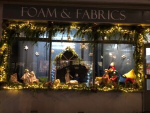 Foam and Fabrics Christmas window display 2021