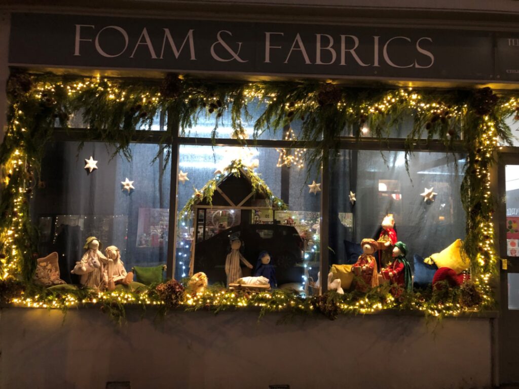 Foam and Fabrics Christmas window display 2021